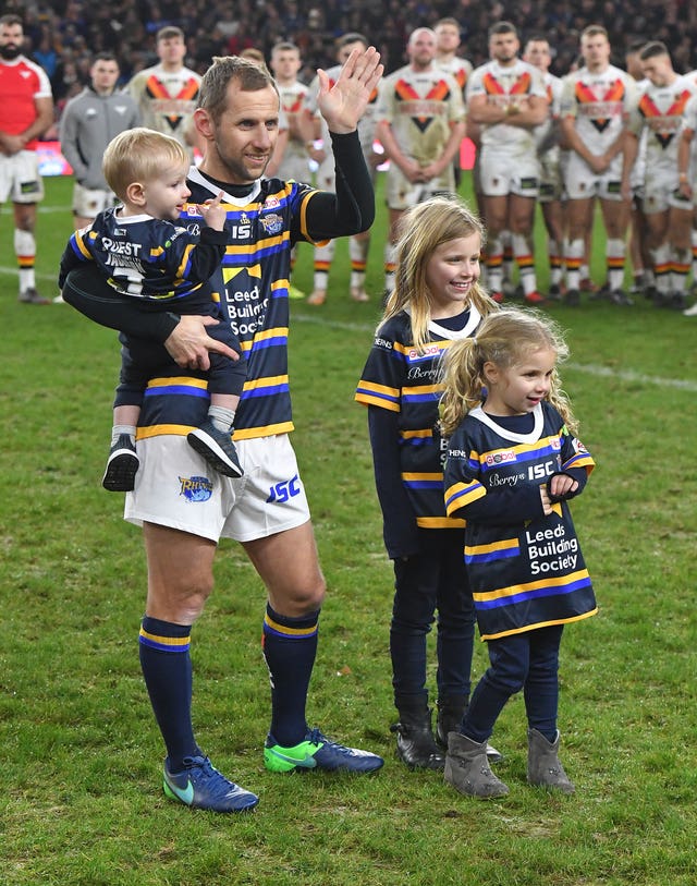 Rob Burrow with his children