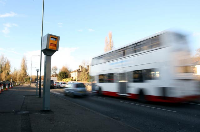 Vehicles driving by a speed camera on the A3