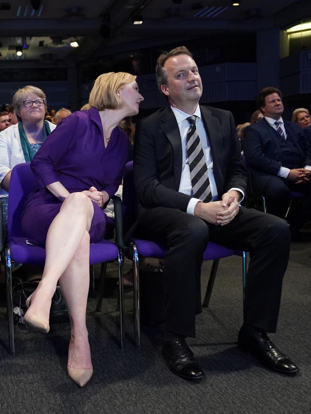 Liz Truss and her husband Hugh O’Leary at the Queen Elizabeth II Centre in London ahead of the Conservative party leadership contest announcement