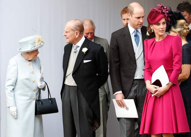 The Queen, the Duke of Edinburgh and the Duke and Duchess of Cambridge leave after the wedding of Princess Eugenie of York and Jack Brooksbank in St George’s Chapel, Windsor Castle 