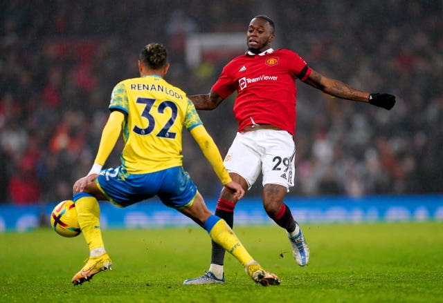 Aaron Wan-Bissaka (right) was handed a rare start against Nottingham Forest 