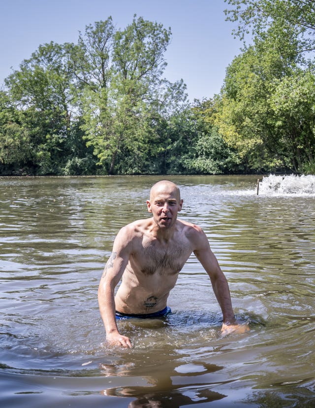 A man swims in a lake in Sandall Park, Doncaster