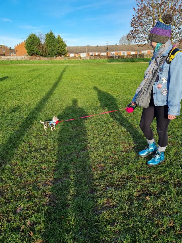 Rebekah Morris with her chihuahua Zero on a lead