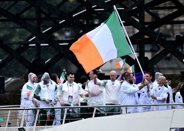 Shane Lowry and Sarah Lavin wave the Irish flag