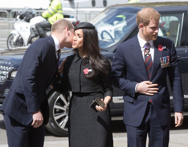 File photo dated 25/04/18 of the then Duke of Cambridge (left) greeting Meghan Markle and Prince Harry as they arrive for the annual Service of Commemoration and Thanksgiving at Westminster Abbey, London, to commemorate Anzac Day. 