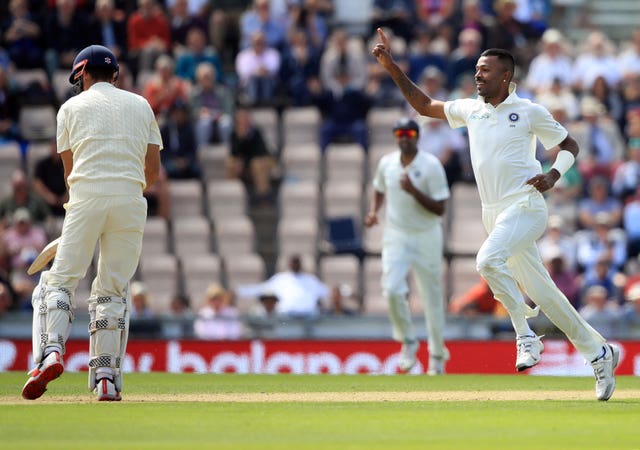 India’s Hardik Panda celebrates taking the wicket of Alastair Cook
