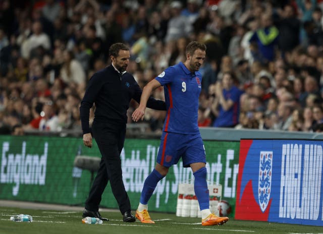Gareth Southgate, left, congratulates Harry Kane after his goalscoring outing against Switzerland