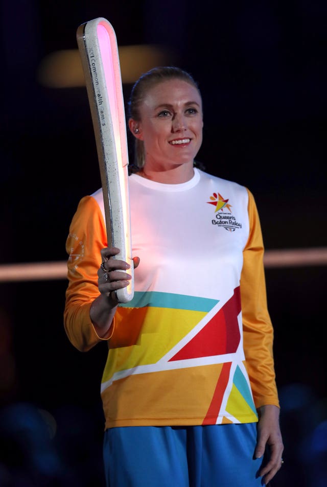 Sally Pearson with the Queen’s baton during the opening ceremony for the 2018 Commonwealth Games at the Carrara Stadium on the Gold Coast 