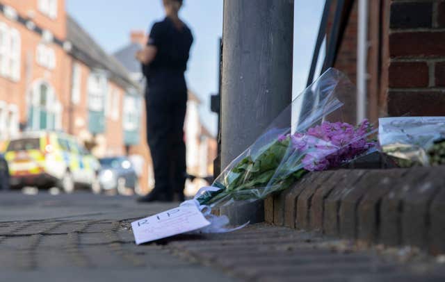 Flowers at the scene in Rollestone Street, Salisbury, where counter-terrorism officers are investigating after Dawn Sturgess died after she and her partner were exposed to the nerve agent Novichok