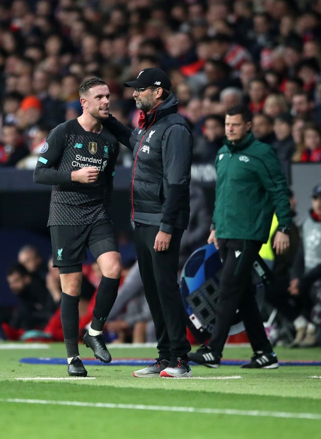 Jordan Henderson leaves the field against Atletico Madrid 