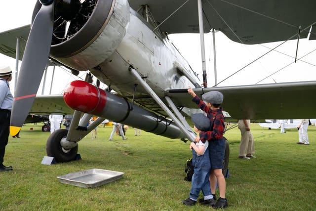 Young visitors inspect the Freddie March Spirit of Aviation display