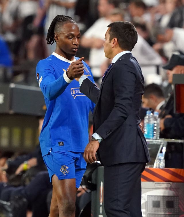 Rangers’ Joe Aribo shakes hands with manager Giovanni van Bronckhorst 