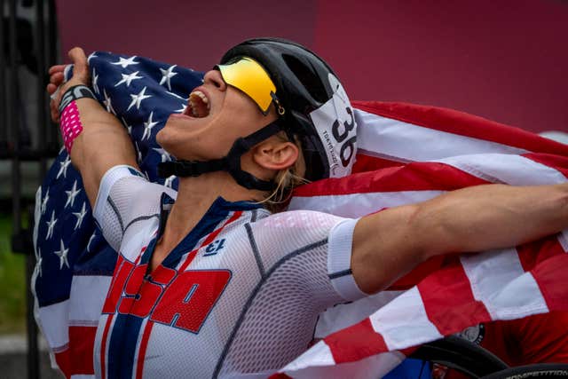 USA's Oksana Masters celebrates after wining at women's H5 road race