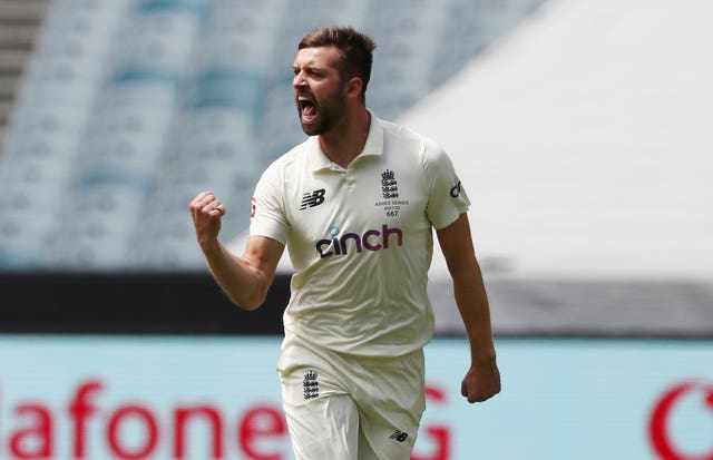 England’s Mark Wood celebrates