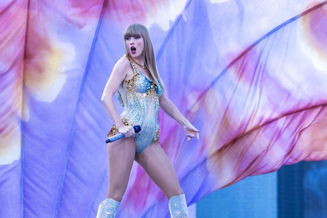 Taylor Swift performing on stage during her Eras Tour at Murrayfield Stadium in Edinburgh