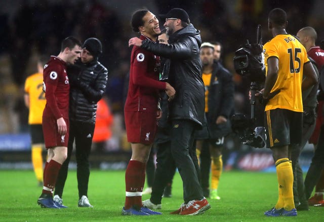 Jurgen Klopp celebrates with Virgil Van Dijk