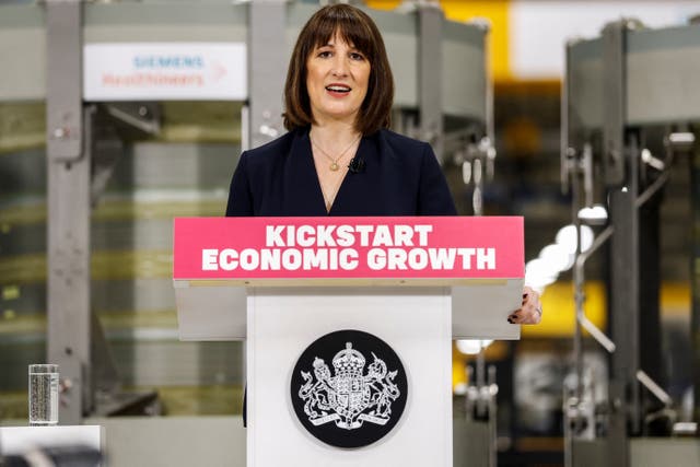 Chancellor Rachel Reeves delivers a speech at a lectern