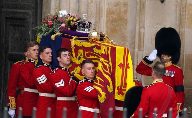 The Queen's coffin leaves Westminster Abbey after the service