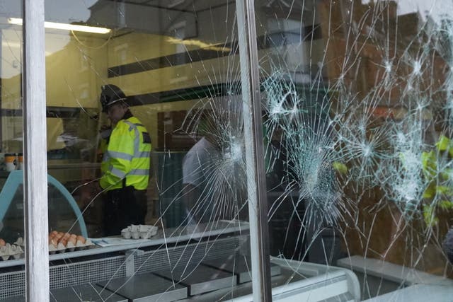 Damage to a butcher's shop window