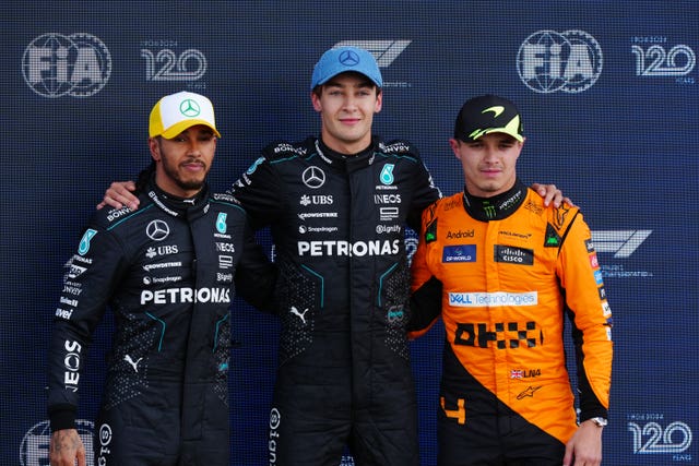 Norris, right, with fellow British drivers Lewis Hamilton, left, and  George Russell in 2024 
