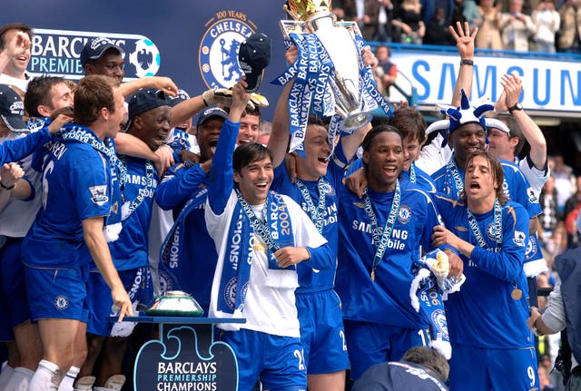 John Terry lifts the Premier League trophy after beating Manchester United
