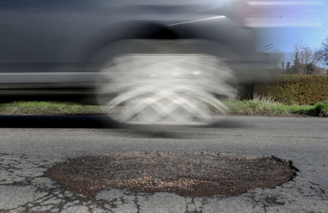 A pothole (Gareth Fuller/PA)