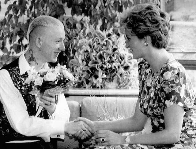 The Princess of Wales shaking hands with William Drake, a patient at the London Lighthouse Aids Centre. PA Archive/PA Images