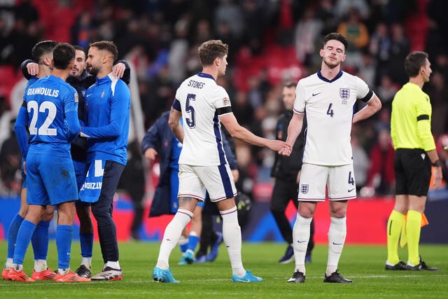 England’s Declan Rice (right) and John Stones (centre) react after the UEFA Nations League defeat to Greece