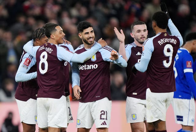 Aston Villa’s Marco Asensio (centre) celebrates