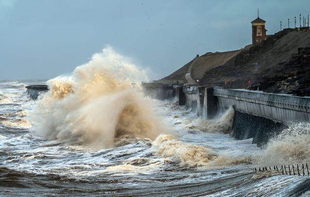 Waves break on the sea front in Blackpool