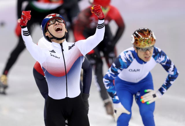 Republic of Korea’s Hyojun Lim savours claiming the host nation's first gold of the Games in the men's 1500m short track final 