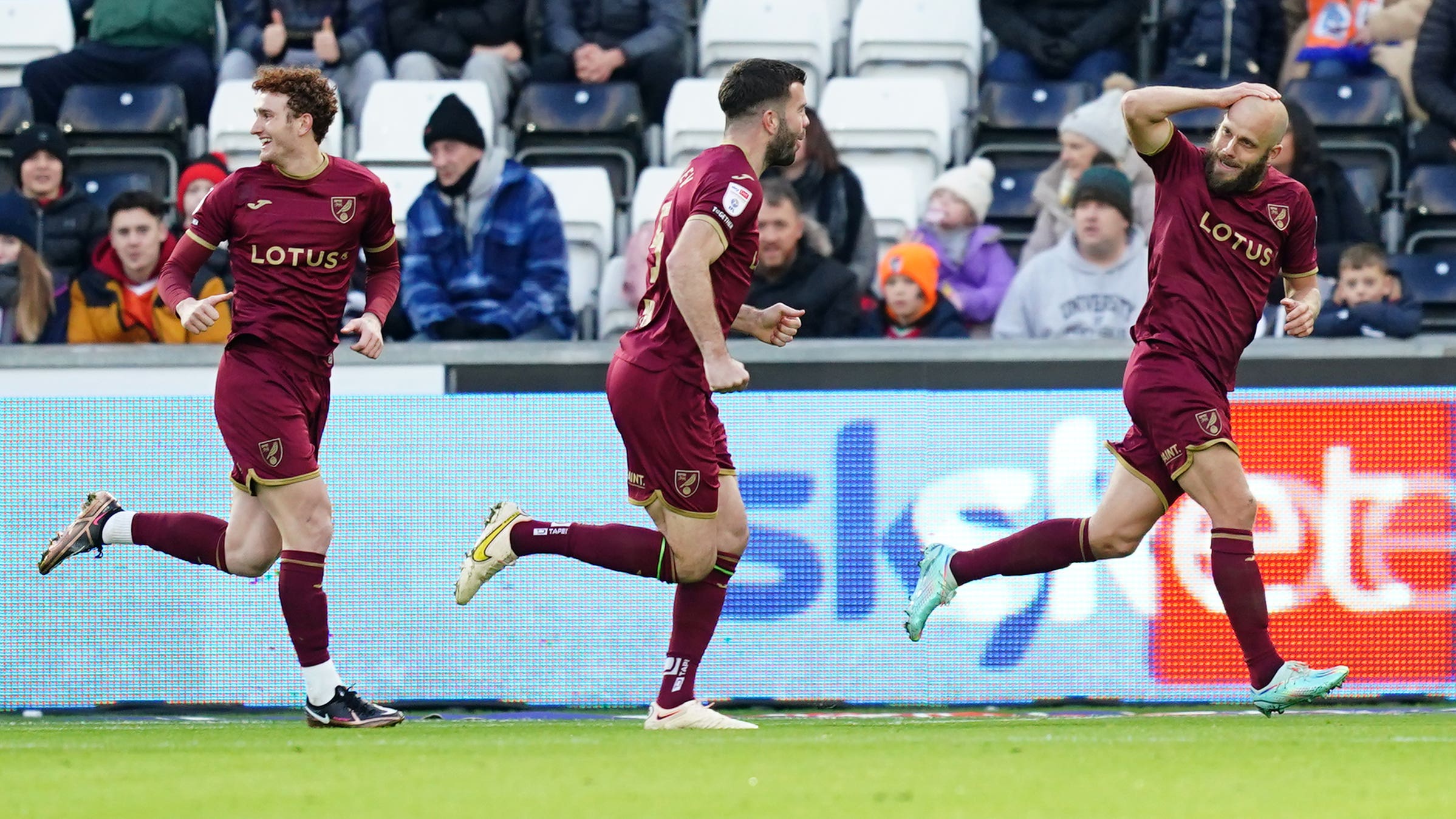 Teemu Pukki, right, celebrates his early winner (David Davies/PA)