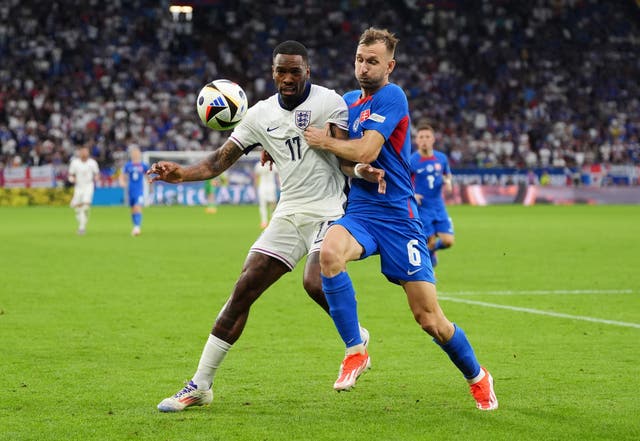 England’s Ivan Toney, left, and Slovakia’s Norbert Gyomber battle for the ball during the UEFA Euro 2024 round-of-16 match at the Arena AufSchalke in Gelsenkirchen