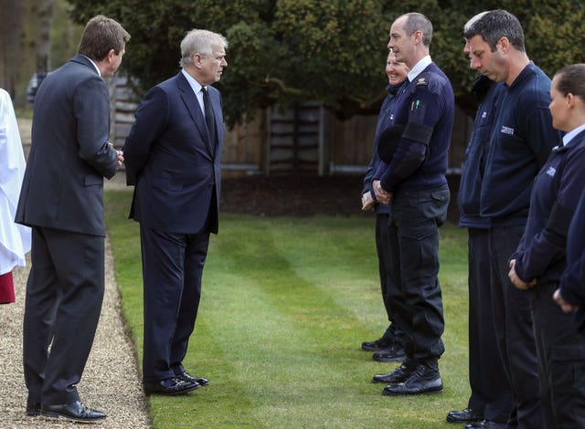 The Duke of York (second left) spoke with Crown Estate staff in Windsor (Steve Parsons/PA)