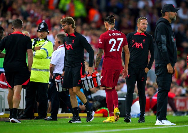 Liverpool’s Darwin Nunez (centre right) leaves the pitch after being sent off against Crystal Palace