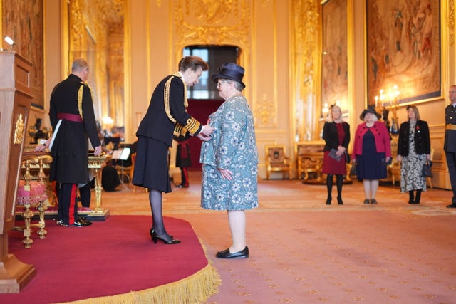 Primcess Royal pins medal on Dame Therese Coffey