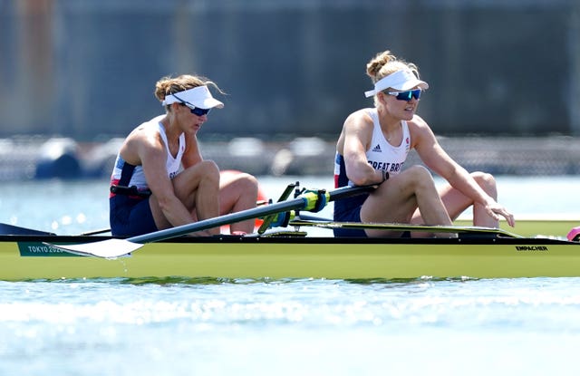 Helen Glover and Polly Swann qualified for the women's pairs semi-finals after finishing third in their heat 