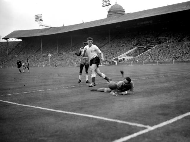Tommy Taylor in action for England