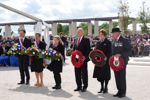 Defence Secretary John Healey (centre) lays a wreath during a ceremony at the British Normandy Memorial in Ver-sur-Mer, France, to mark the 81st anniversary of the D-Day landings 