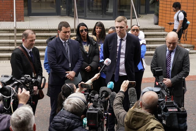 Detective Constable Lee Swift (second left) with Charlie Mclean, the mother of Khayri Mclean (centre left), and CPS prosecutor Dan Lee speaking to the media outside Leeds Crown Court 