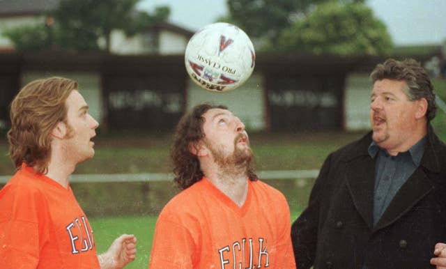 Warming up before a charity football match in aid of the Calton Athletic drugs rehabilition and prevention project are actors (l/r), Ewan McGregor, Phil Kay and Robbie Coltrane on June 11 1997