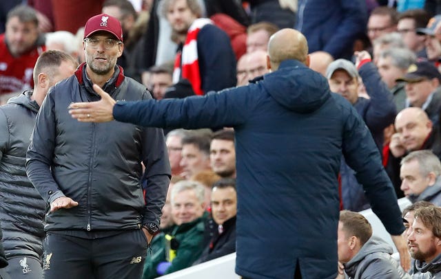 Jurgen Klopp, left, and Pep Guardiola face off again next weekend