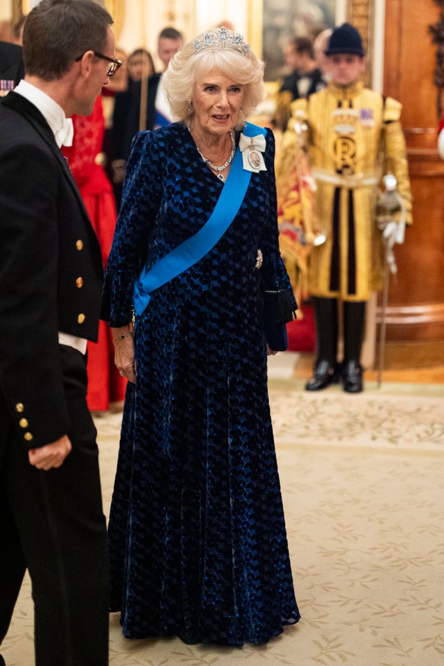 The Queen wore the late Queen's small aquamarine tiara