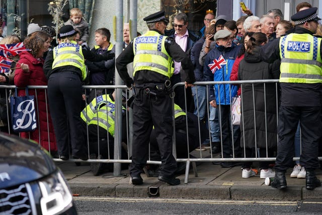 Police detain protester Patrick Thelwell (Jacob King/PA)