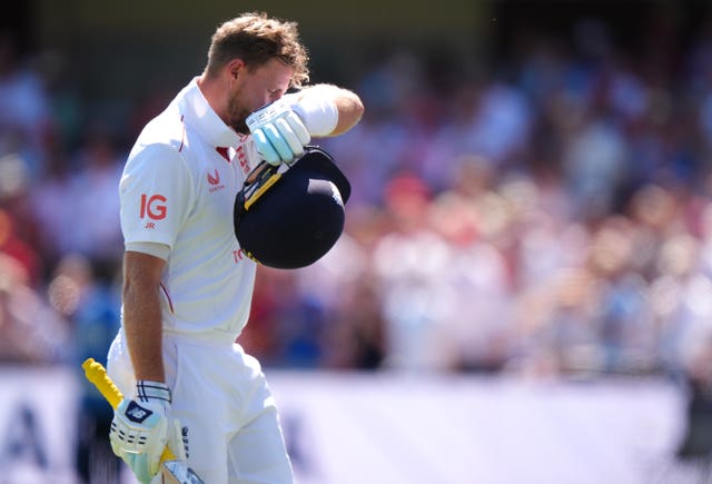 Joe Root walks off the field after being bowled out