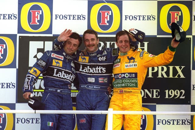 Brundle on the podium alongside Nigel Mansell at the 1992 British Grand Prix 