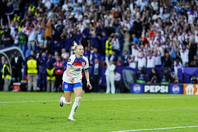 Chloe Kelly celebrates after scoring the winning penalty