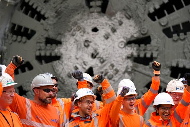 Construction workers for HS2 stand by the 2,000-tonne tunnel boring machine named Dorothy