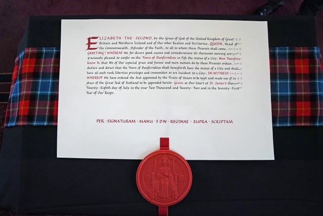 The letters patent confirming Dunfermline formally awarded city status as King Charles III and the Queen Consort attend an official council meeting at the City Chambers in Dunfermline, Fife, to formally mark the conferral of city status on the former town, ahead of a visit to Dunfermline Abbey to mark its 950th anniversary