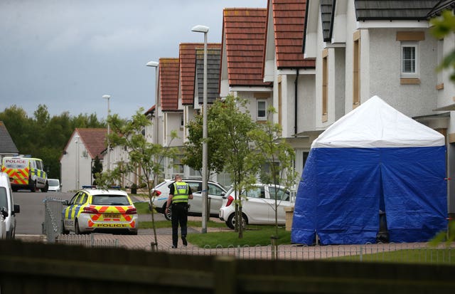 Police and forensic officers in Monkton, Ayrshire, where Emma Faulds from Kilmarnock, was last seen